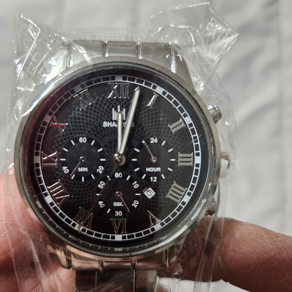Chrome watch black face